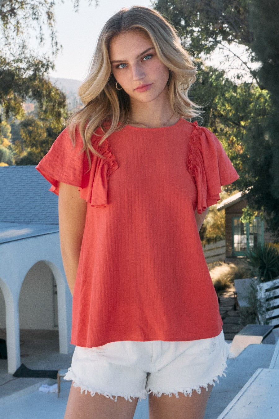 orange ruffle sleeve top